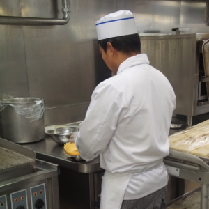 chef working on a ship